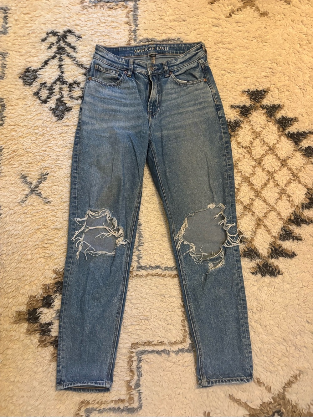 American Eagle Outfitters Light Blue Skinny Jeans with Knee Rips